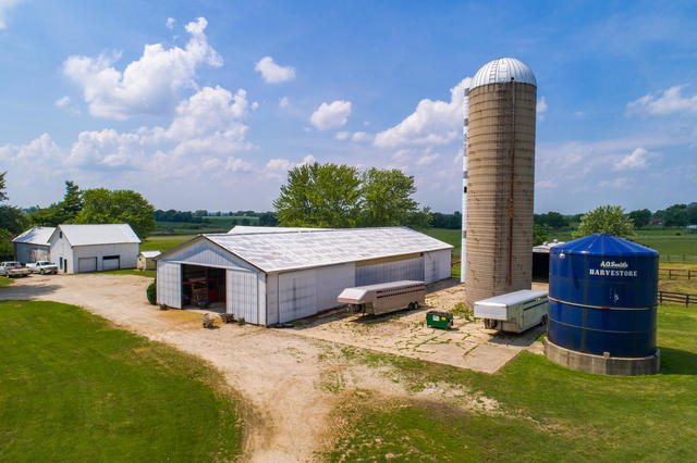 1111 Simons Road Oswego, IL 60543 - Photo 32 of 37 a aerial view of a house with backyard and a yard