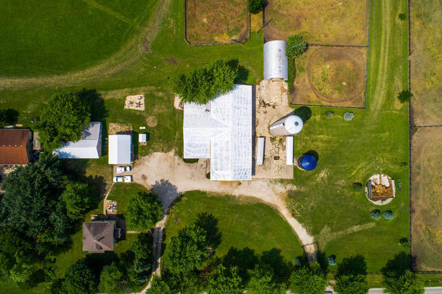 1111 Simons Road Oswego, IL 60543 - Photo 37 of 37 an aerial view of a residential houses with yard