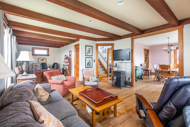 1111 Simons Road Oswego, IL 60543 - Photo 4 of 37 a living room with furniture and a large window