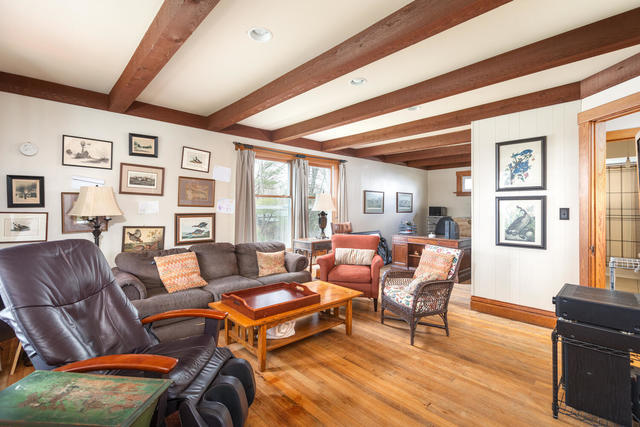 1111 Simons Road Oswego, IL 60543 - Photo 5 of 37 a living room with furniture a flat screen tv and a window