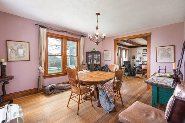 1111 Simons Road Oswego, IL 60543 - Photo 8 of 37 a view of a dining room with furniture window and wooden floor