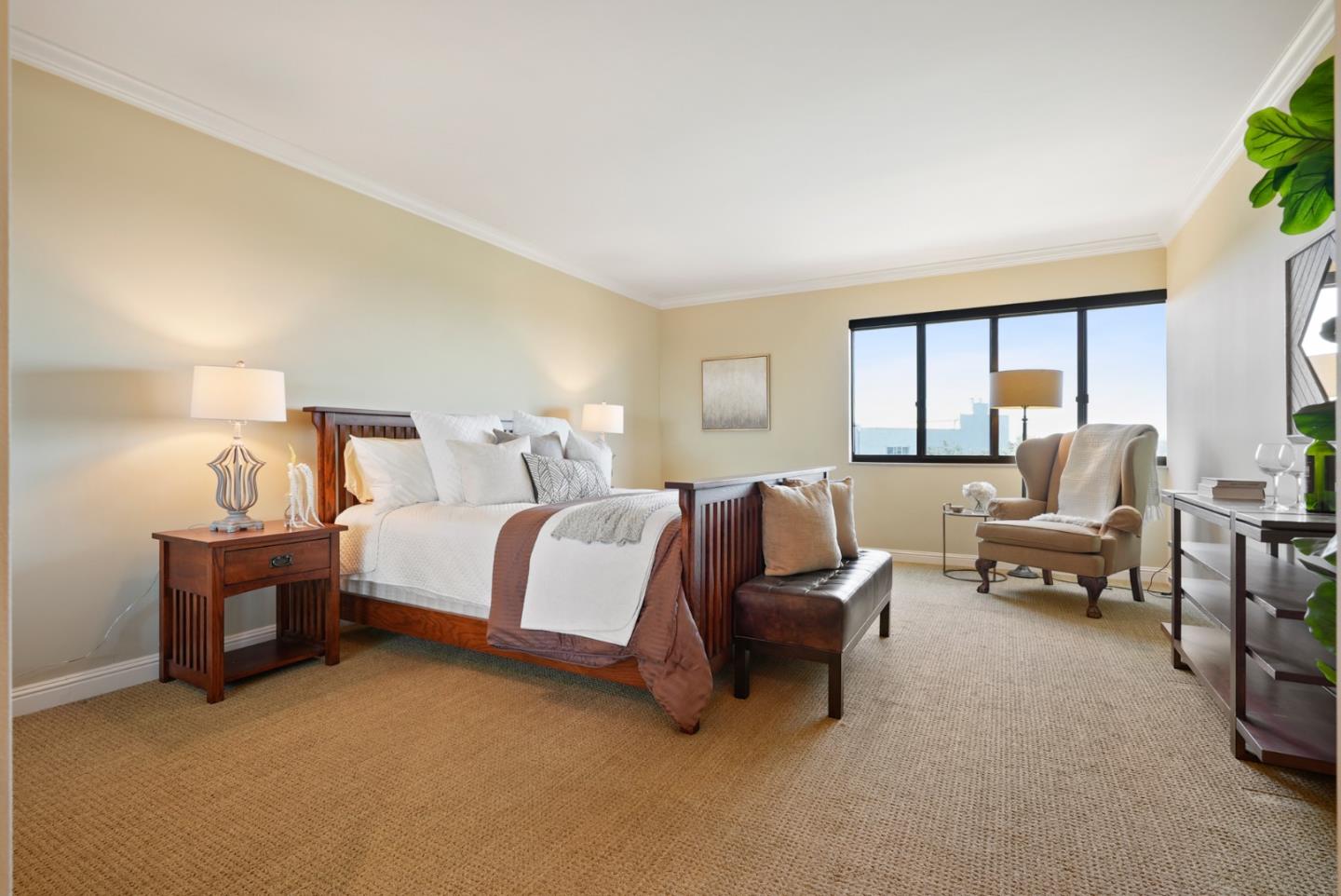 50 Mounds Road, Unit 205 San Mateo, CA 94402 - Photo 14 of 28 a spacious bedroom with a bed and a couch