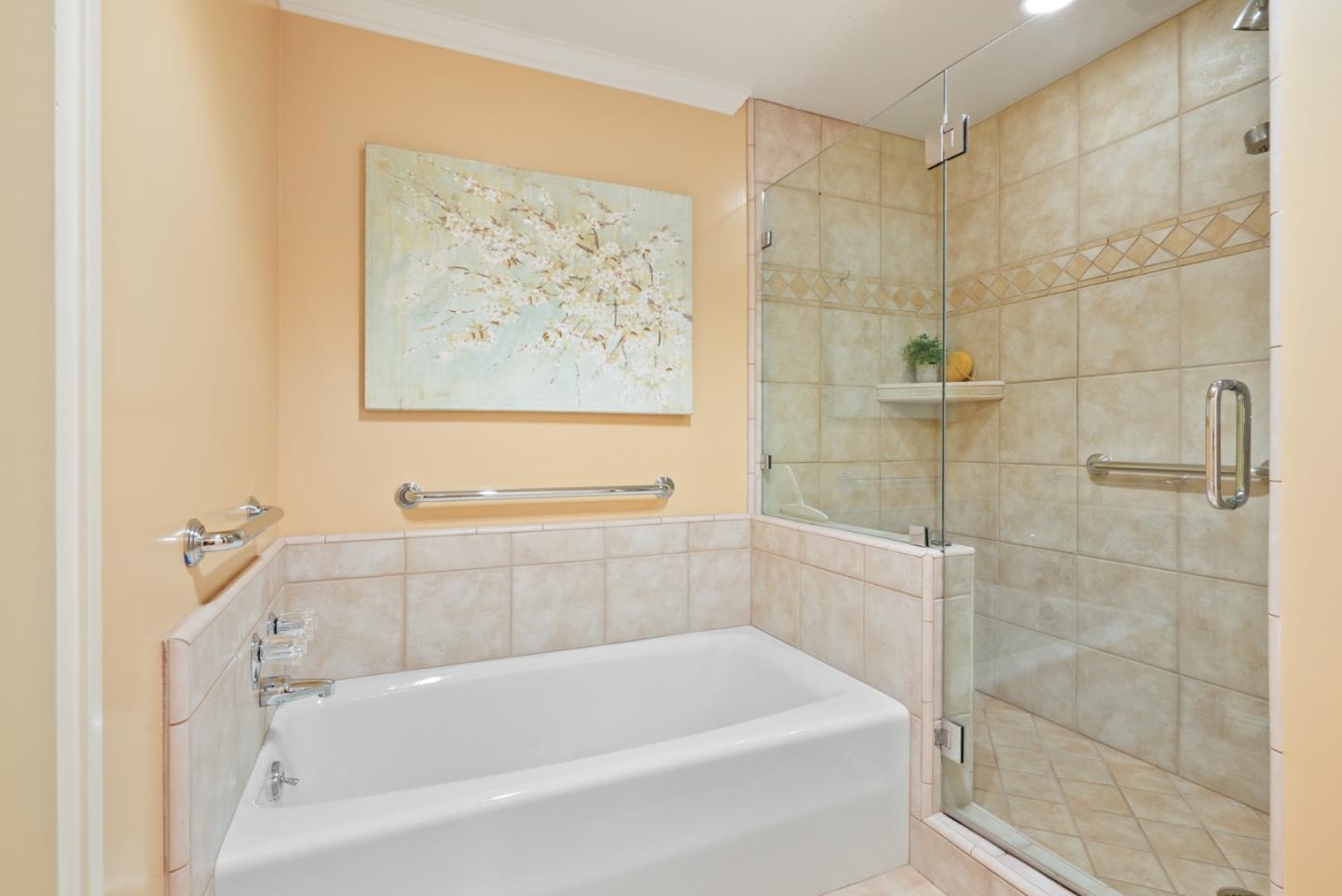 50 Mounds Road, Unit 205 San Mateo, CA 94402 - Photo 19 of 28 a white bath tub sitting next to a white sink and vanity