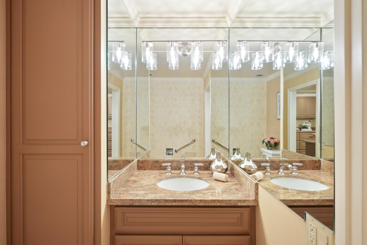 50 Mounds Road, Unit 205 San Mateo, CA 94402 - Photo 20 of 28 a bathroom with a granite countertop sink and a mirror