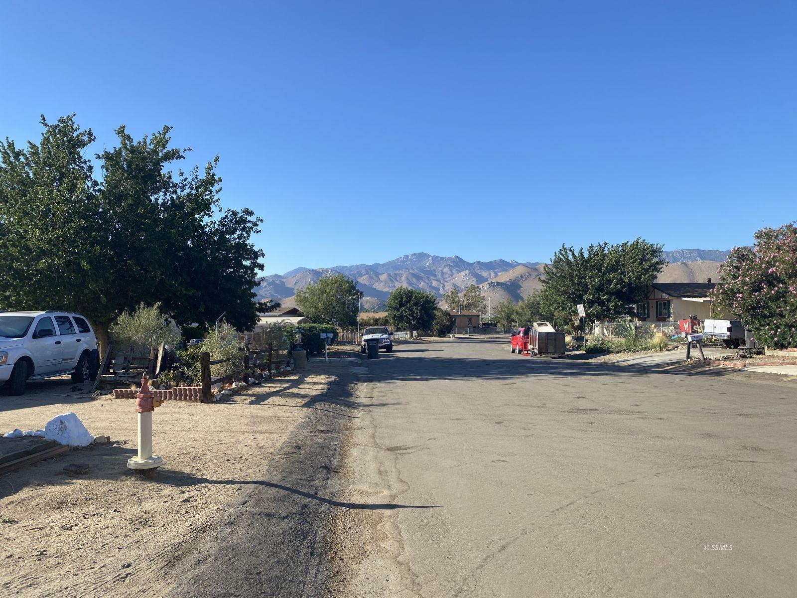 9003 Apache Drive Weldon, CA 93283 - Photo 3 of 5 a view of a street with a building and trees in the background