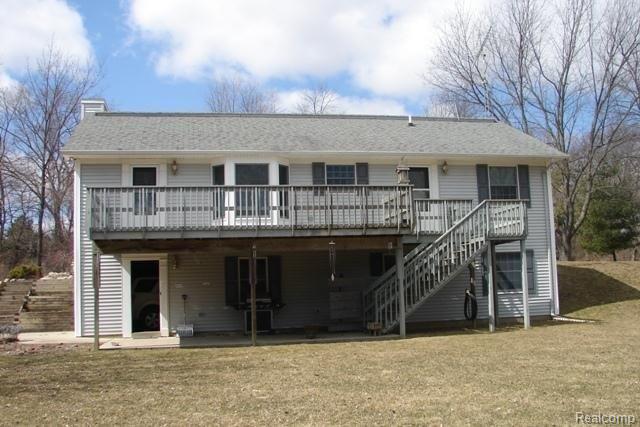 3329 North Branch Road North Branch, MI 48461 - Photo 13 of 20 14 Back side of home with deck.j