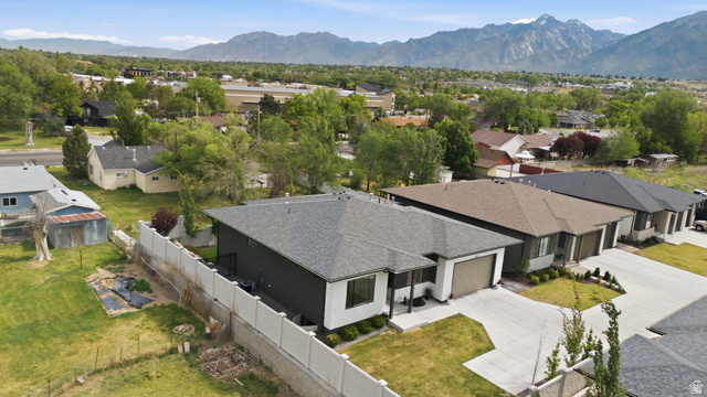 653 East Vandalay Lane Draper, UT 84020 - Photo 49 of 61 Contemporary single-story residence with a dark gray and white exterior