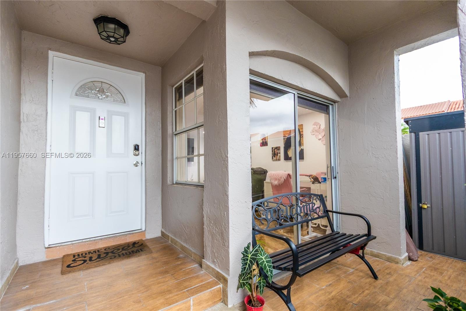 a view of a livingroom with furniture and front door