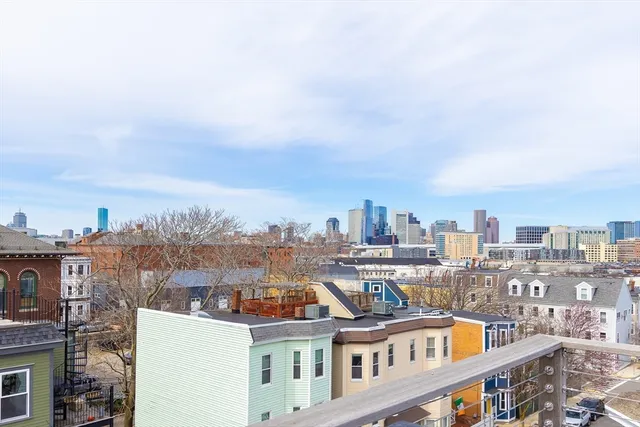 a view of a city with tall buildings