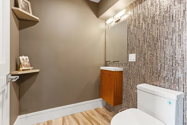 a bathroom with a sink and toilet