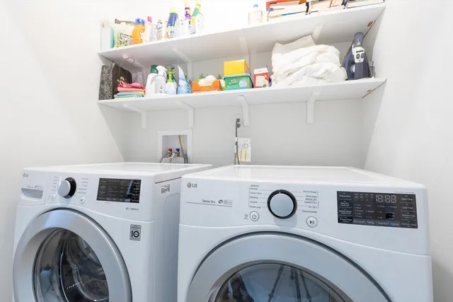 a utility room with dryer and washer