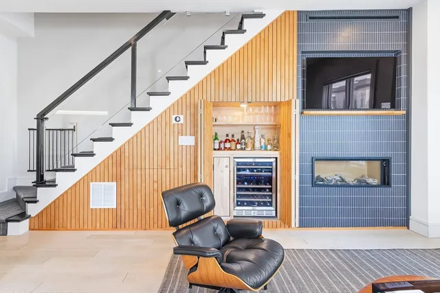 a view of staircase with furniture and staircase