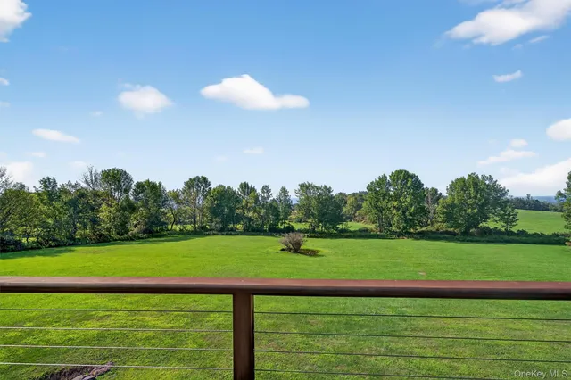 a view of a golf course with a lake