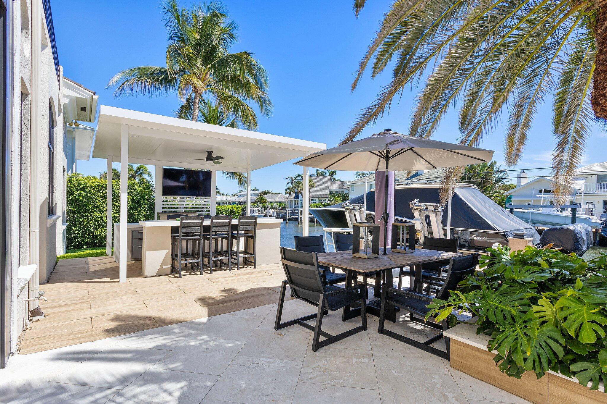22 Eleuthera Drive Ocean Ridge, FL 33435 - Photo 68 of 92 Outdoor Kitchen and Dining