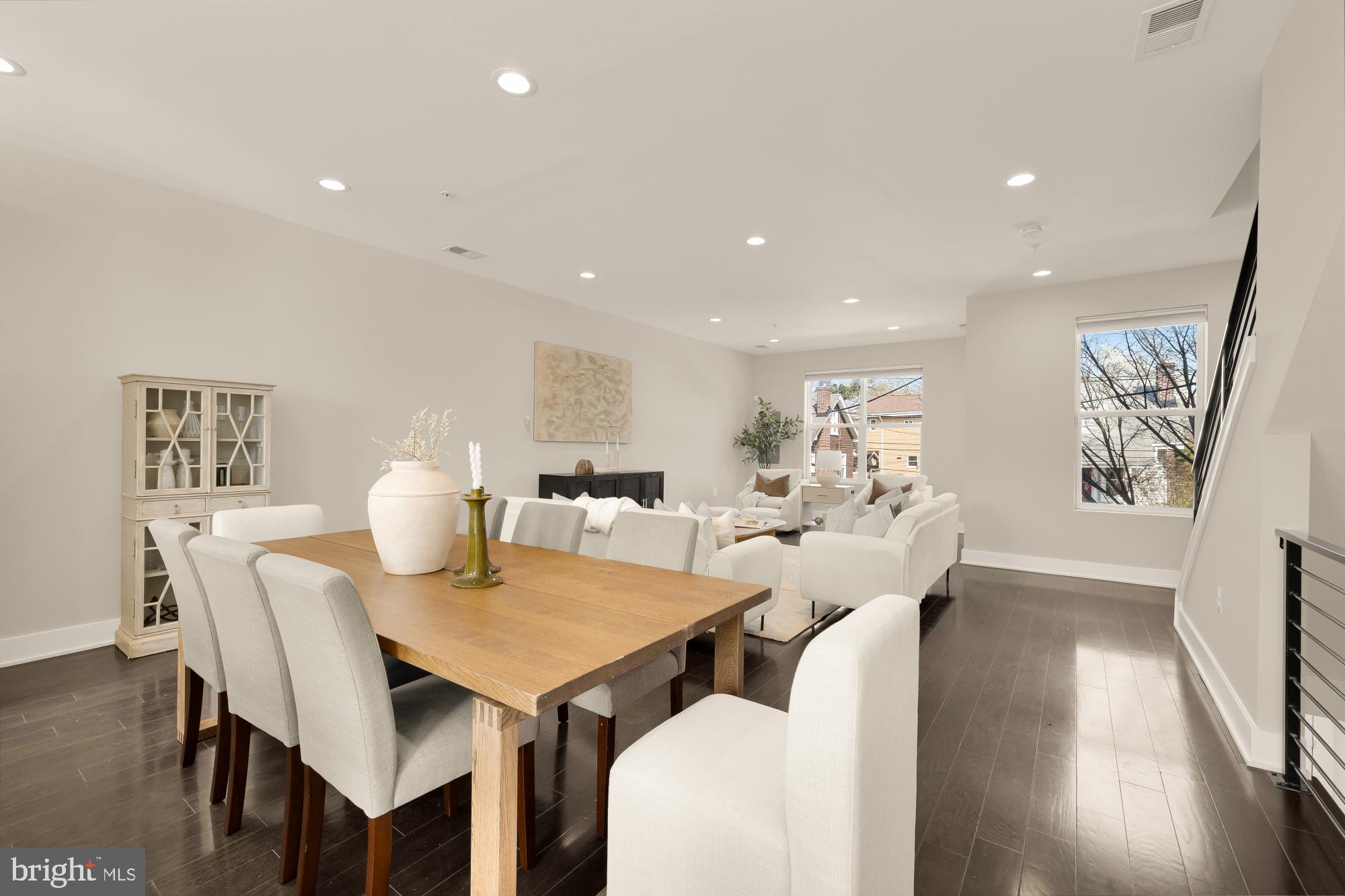 3302 9th Street Northeast, Unit 2 Washington, DC 20017 - Photo 14 of 40 a view of a dining room with furniture and wooden floor
