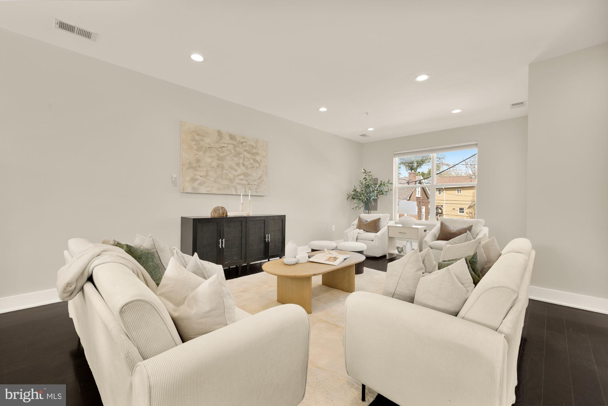 3302 9th Street Northeast, Unit 2 Washington, DC 20017 - Photo 16 of 40 a living room with furniture