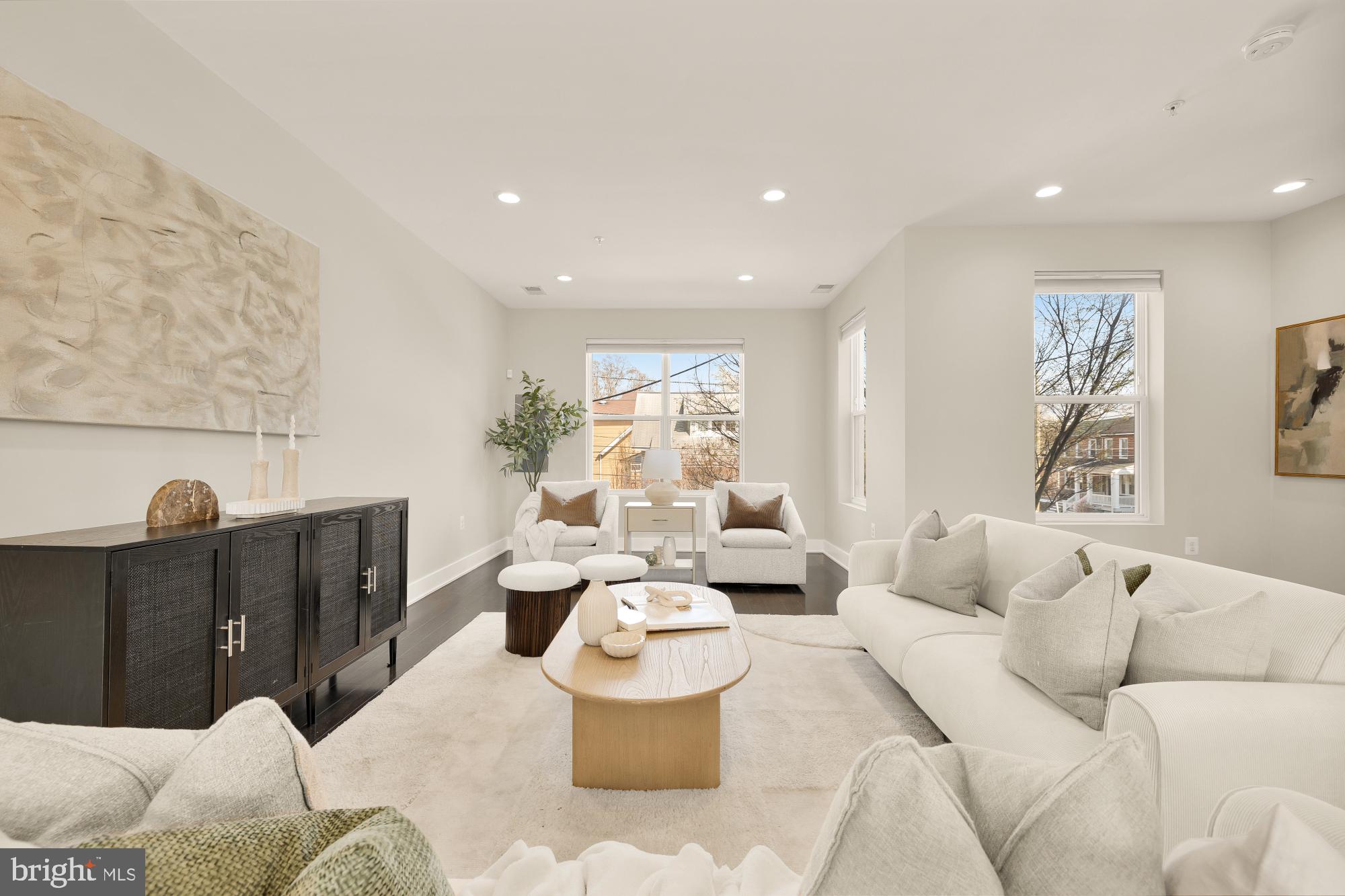 3302 9th Street Northeast, Unit 2 Washington, DC 20017 - Photo 17 of 40 a living room with furniture and a couch