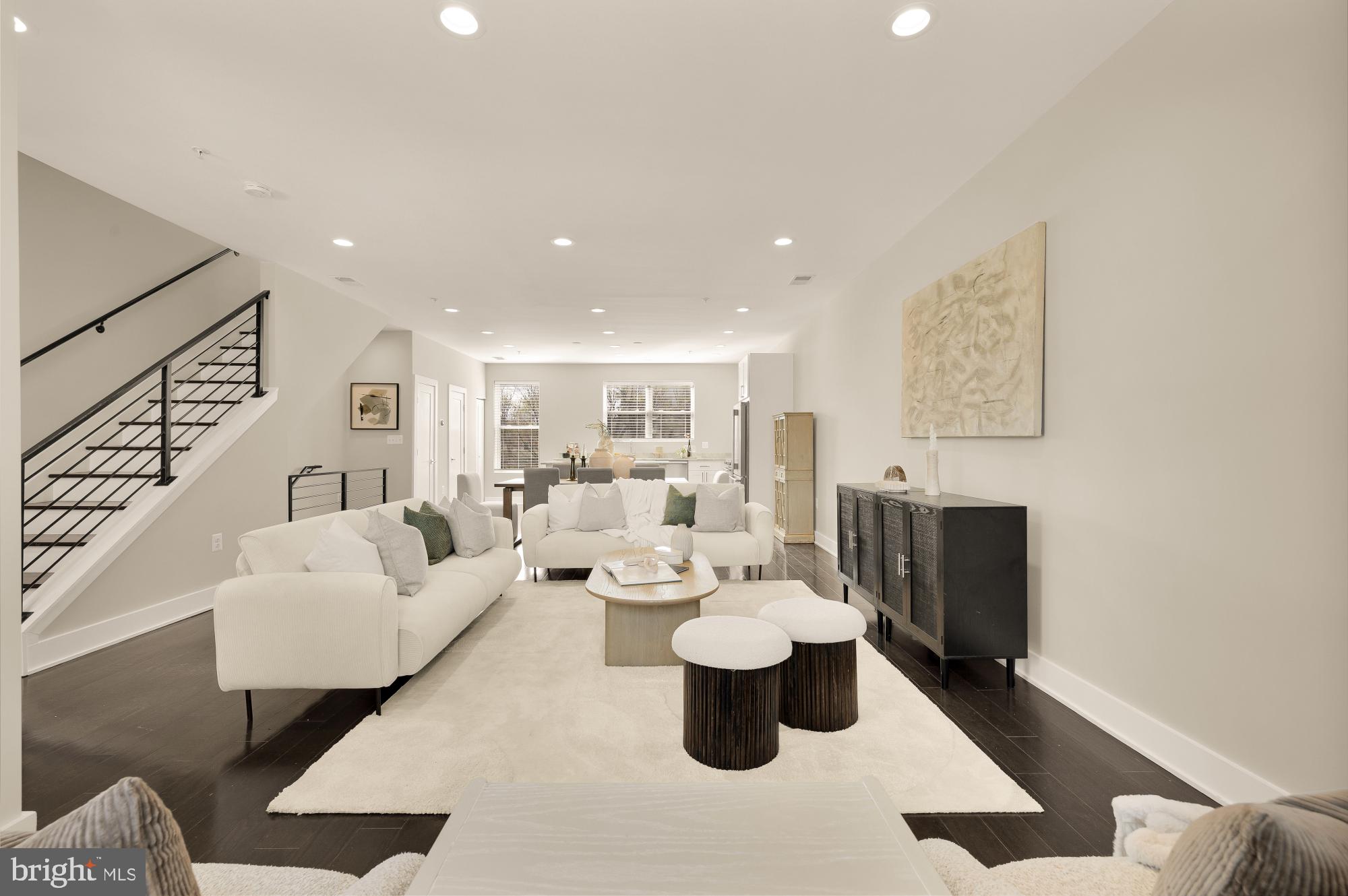 3302 9th Street Northeast, Unit 2 Washington, DC 20017 - Photo 18 of 40 a living room with furniture and a wooden floor