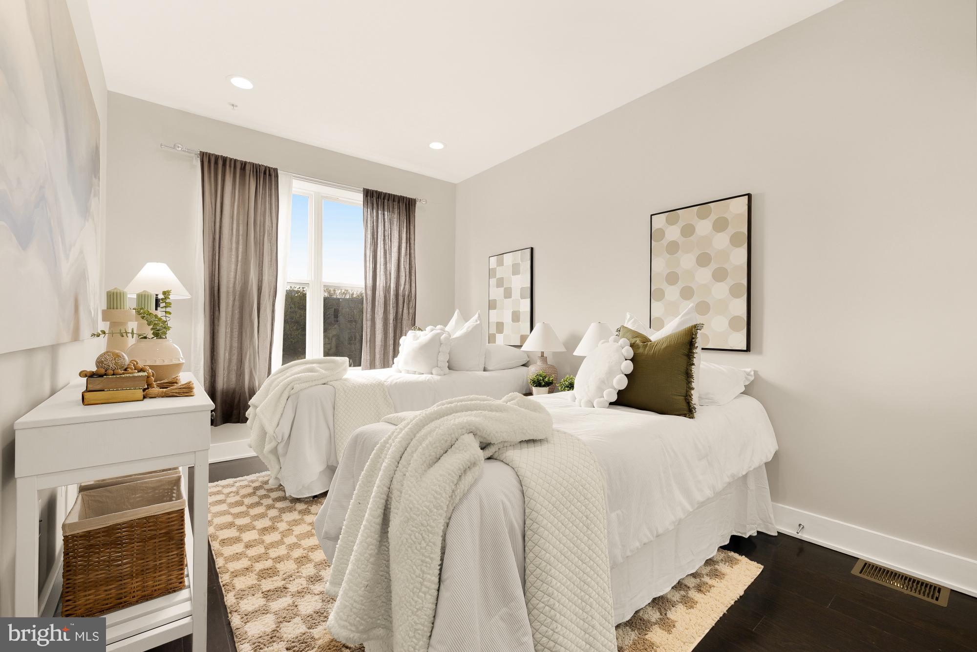 3302 9th Street Northeast, Unit 2 Washington, DC 20017 - Photo 25 of 40 a bedroom with a bed and wooden floor