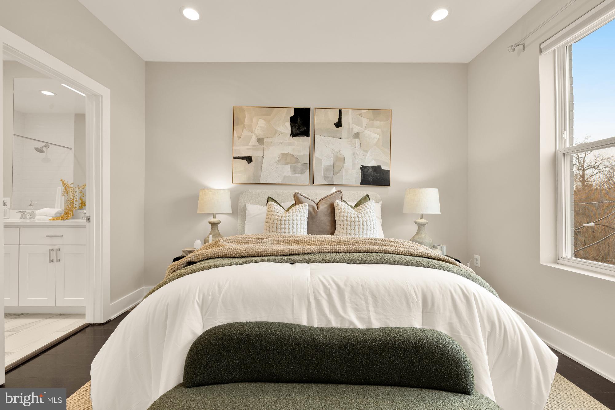 3302 9th Street Northeast, Unit 2 Washington, DC 20017 - Photo 31 of 40 a bedroom with a bed and window