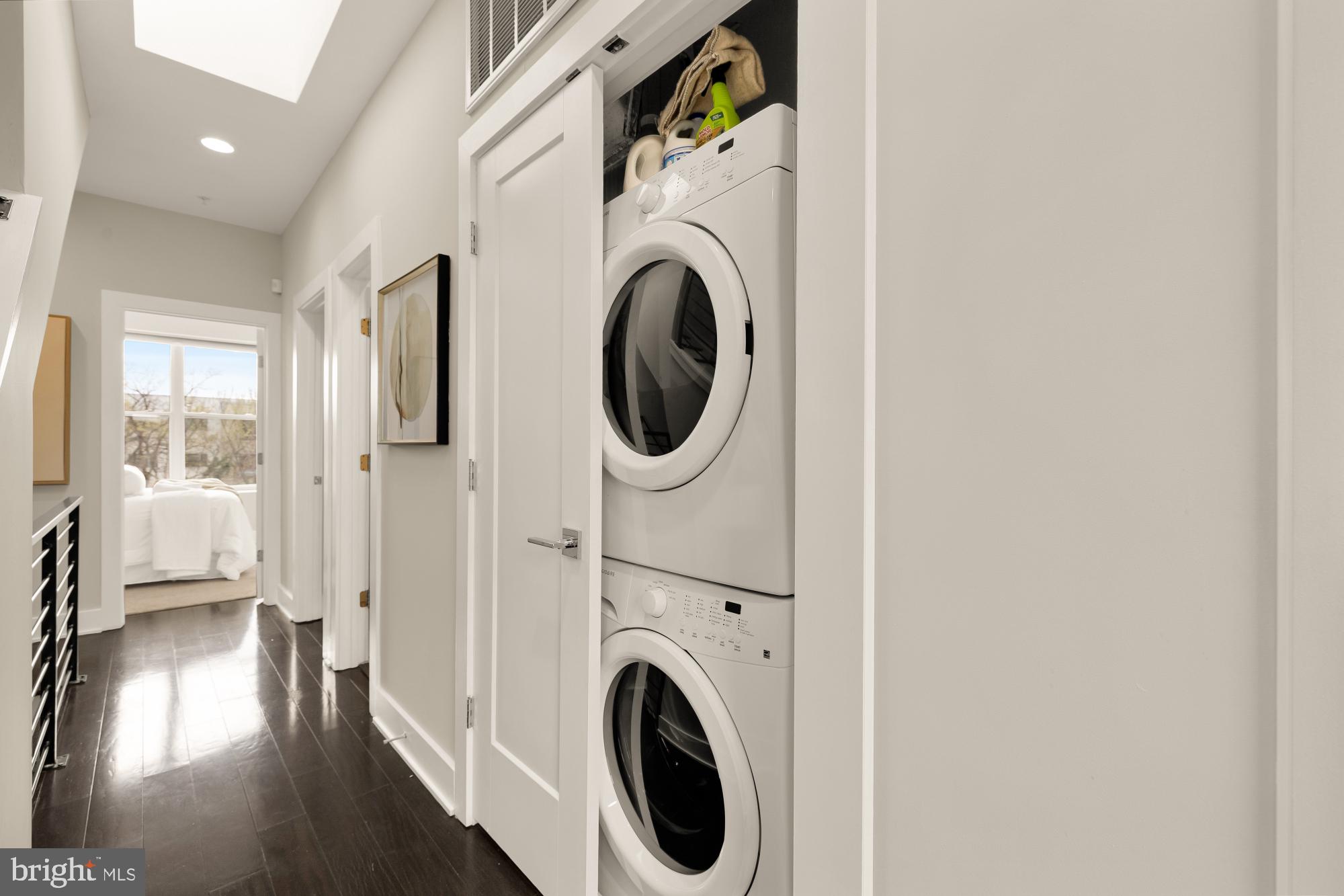3302 9th Street Northeast, Unit 2 Washington, DC 20017 - Photo 36 of 40 a view of a hallway with washer and dryer