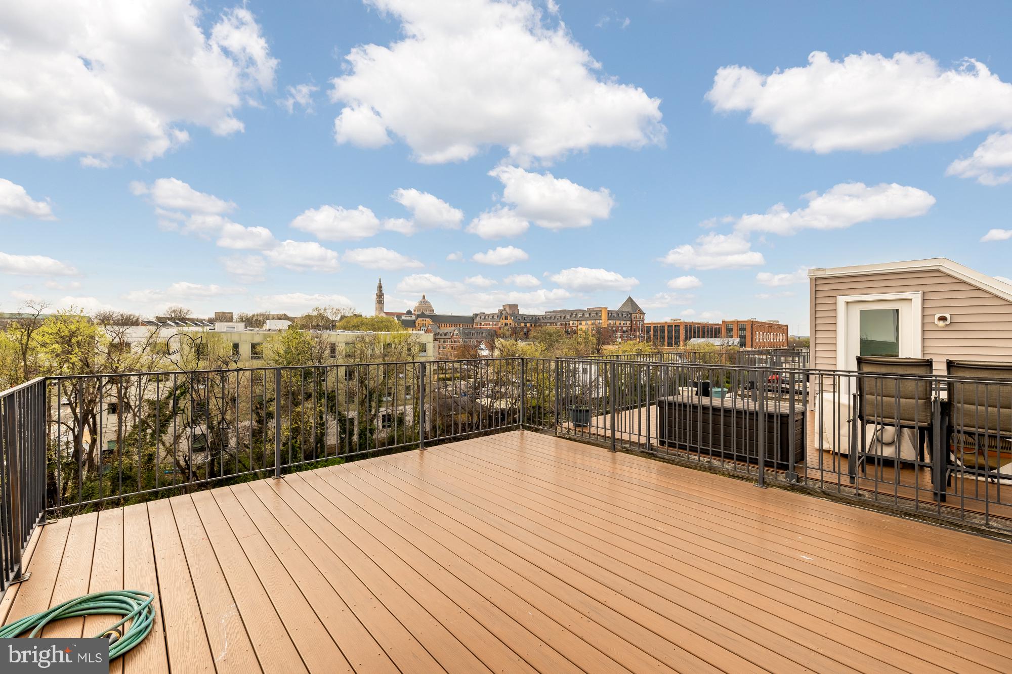3302 9th Street Northeast, Unit 2 Washington, DC 20017 - Photo 38 of 40 a view of a balcony with wooden floor