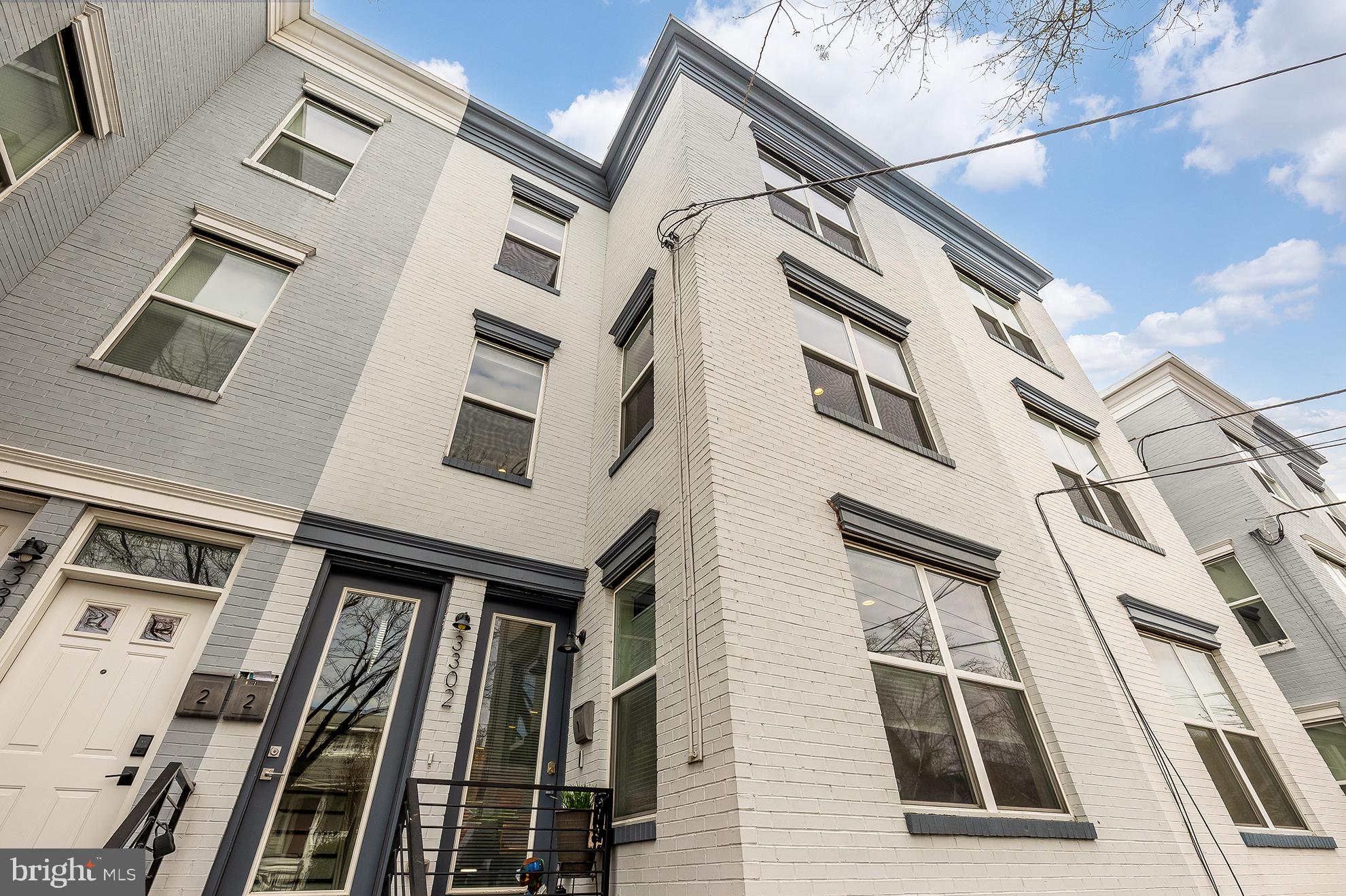 3302 9th Street Northeast, Unit 2 Washington, DC 20017 - Photo 4 of 40 a view of a building with many windows