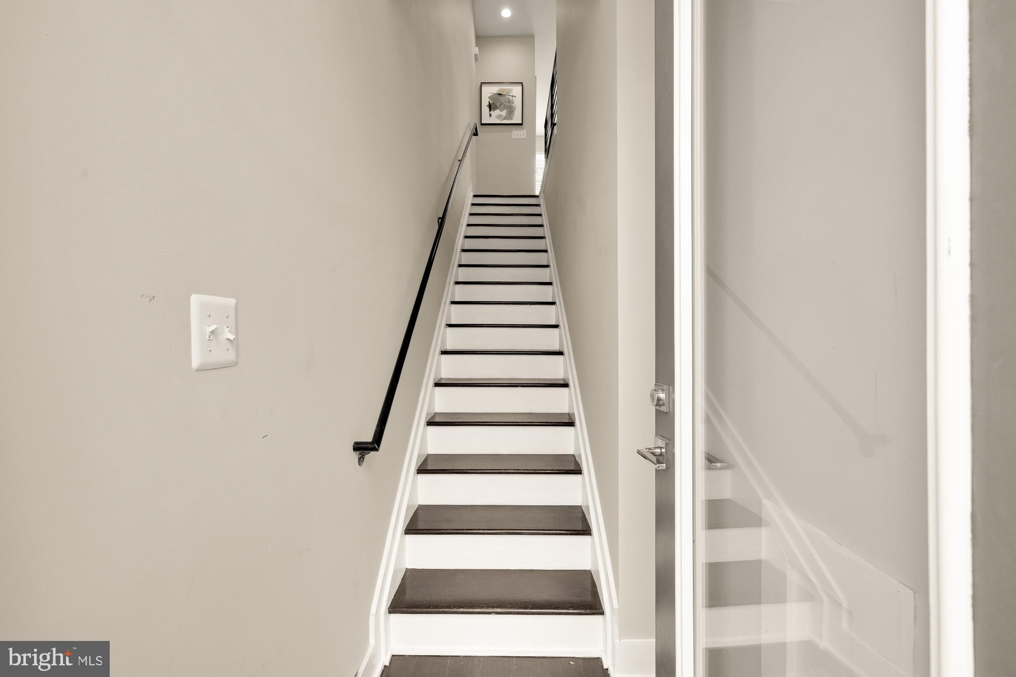 3302 9th Street Northeast, Unit 2 Washington, DC 20017 - Photo 5 of 40 a view of entryway with wooden floor