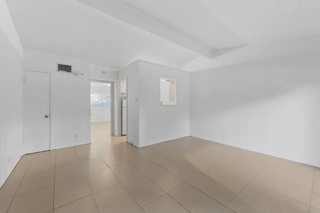 a view of an empty room with window