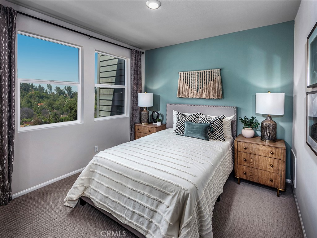4725 Merida Way Oceanside, CA 92057 - Photo 9 of 13 Photos are not of the actual home, but are photos of the builder home with same floorplan with similar interior finishes.