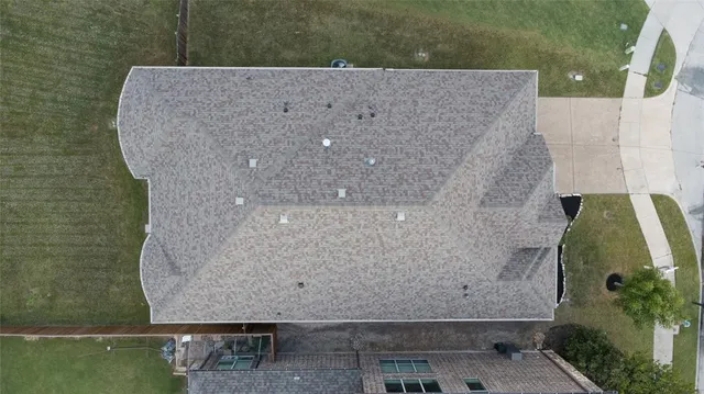 a house view with a garden space