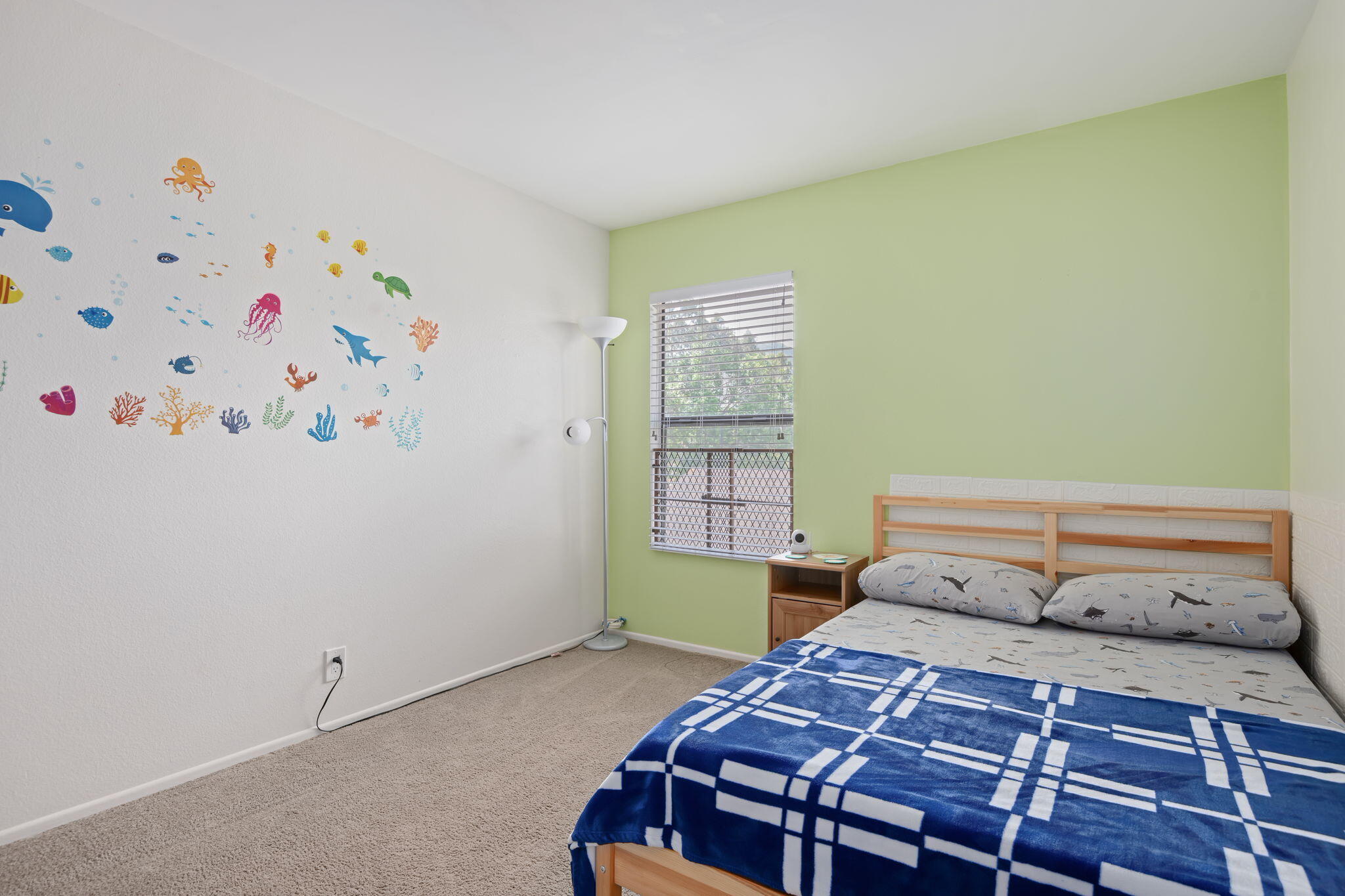 222 Ute Lane Ventura, CA 93001 - Photo 18 of 29 a bedroom with a bed and a window