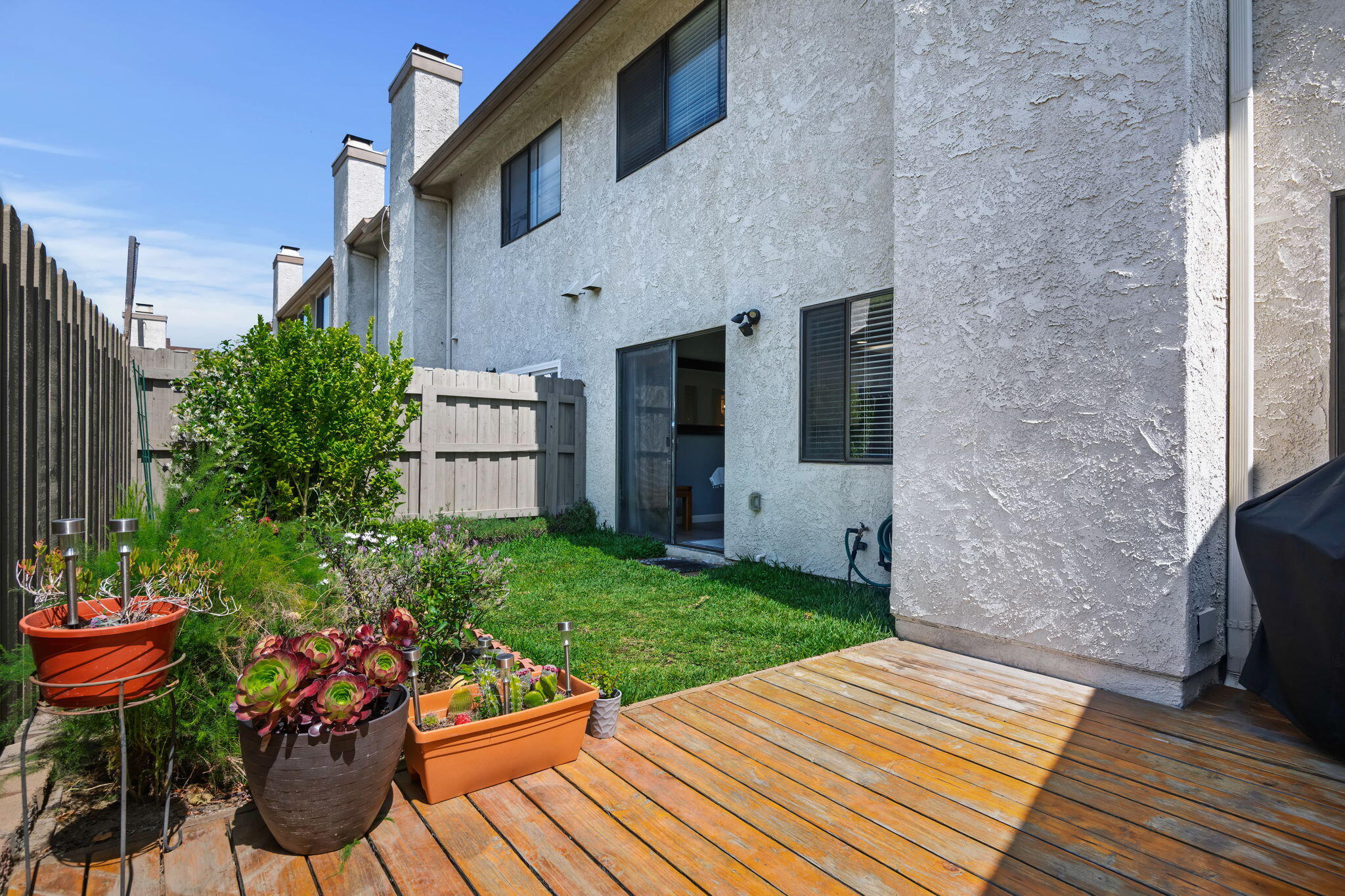 222 Ute Lane Ventura, CA 93001 - Photo 9 of 29 a view of a chairs and table in backyard of the house