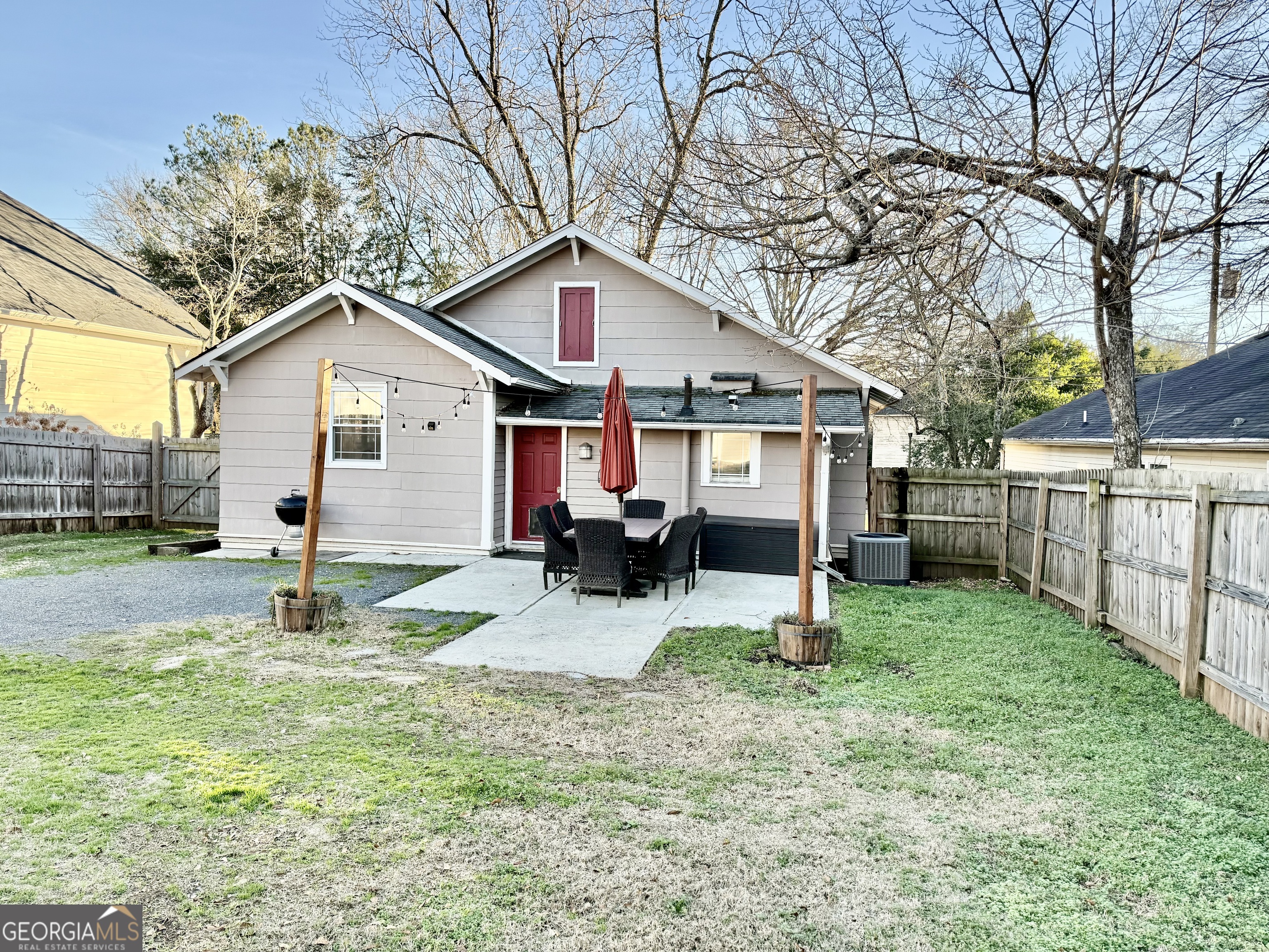 71 Clark Street Newnan, GA 30263 - Photo 18 of 19 a house that has a tree in front of it