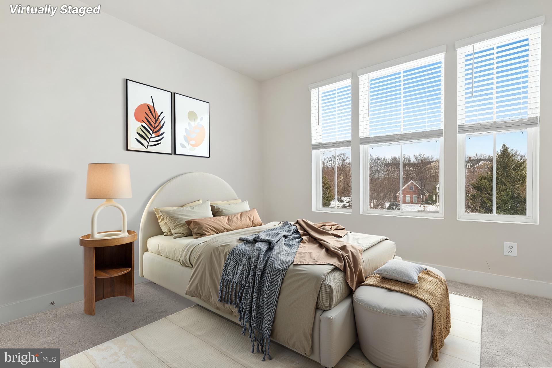 7203 Gringotts Way, Unit A Elkridge, MD 21075 - Photo 13 of 23 a bedroom with bed and a large window