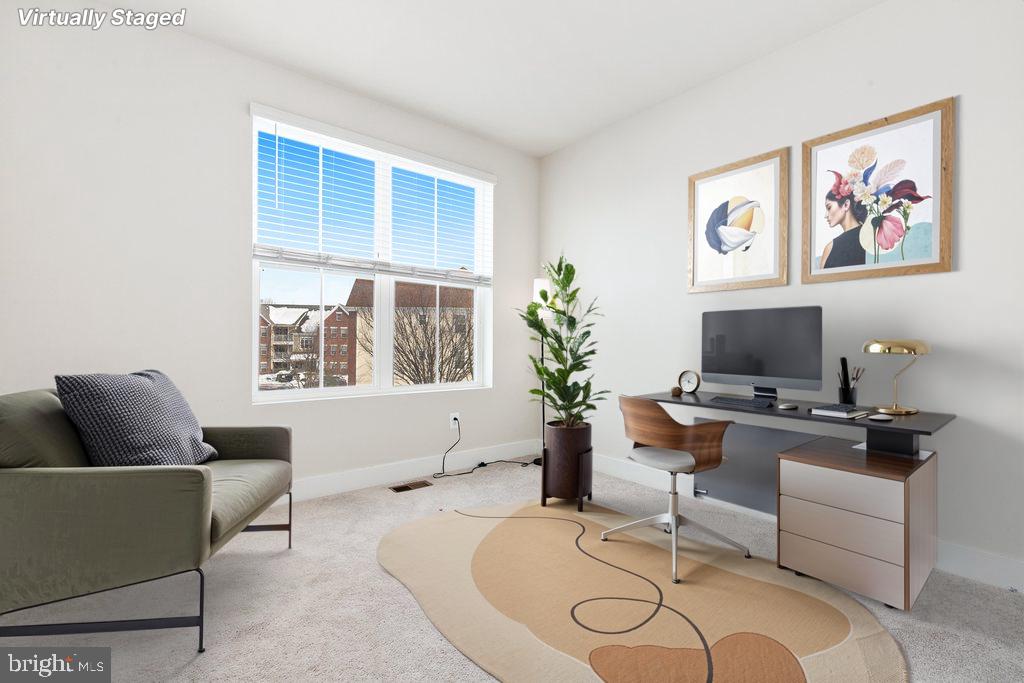 7203 Gringotts Way, Unit A Elkridge, MD 21075 - Photo 15 of 23 a living room with furniture and a flat screen tv