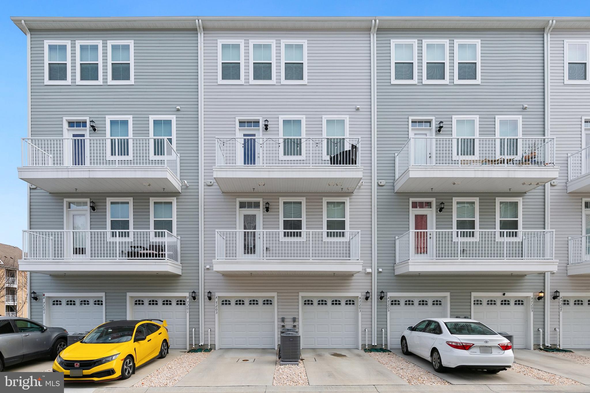 7203 Gringotts Way, Unit A Elkridge, MD 21075 - Photo 20 of 23 a car parked in front of building