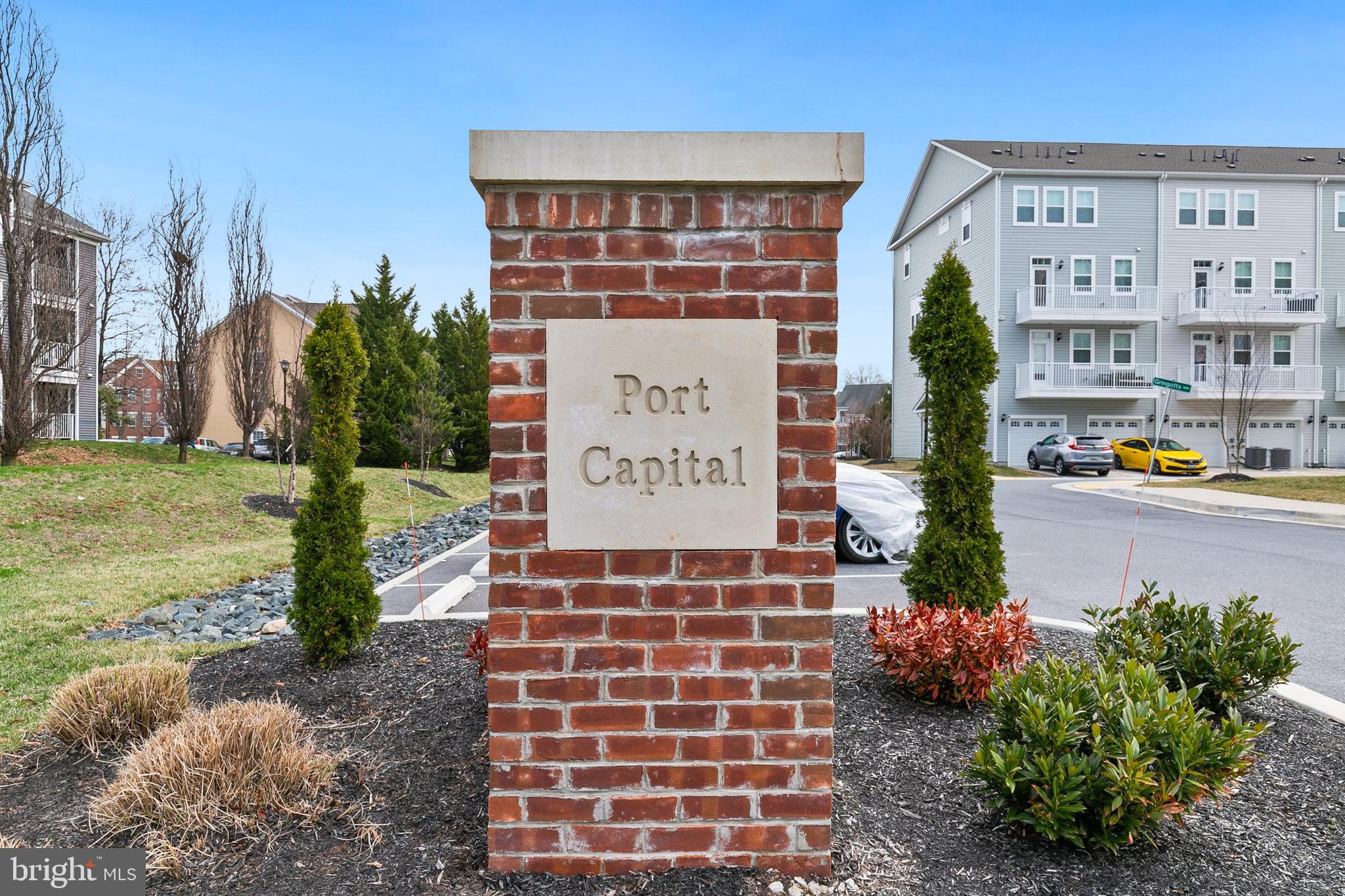 7203 Gringotts Way, Unit A Elkridge, MD 21075 - Photo 22 of 23 a sign on the side of the road