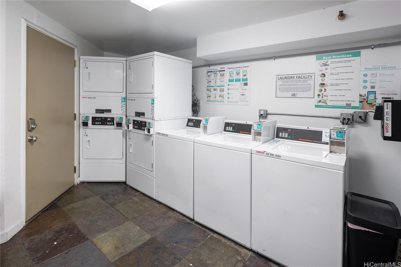 1700 Ala Moana Boulevard, Unit 3104 Honolulu, HI 96815 - Photo 15 of 15 a kitchen with white cabinets and white appliances