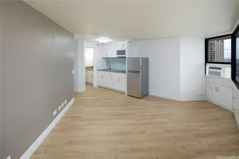 a view of a kitchen with a sink
