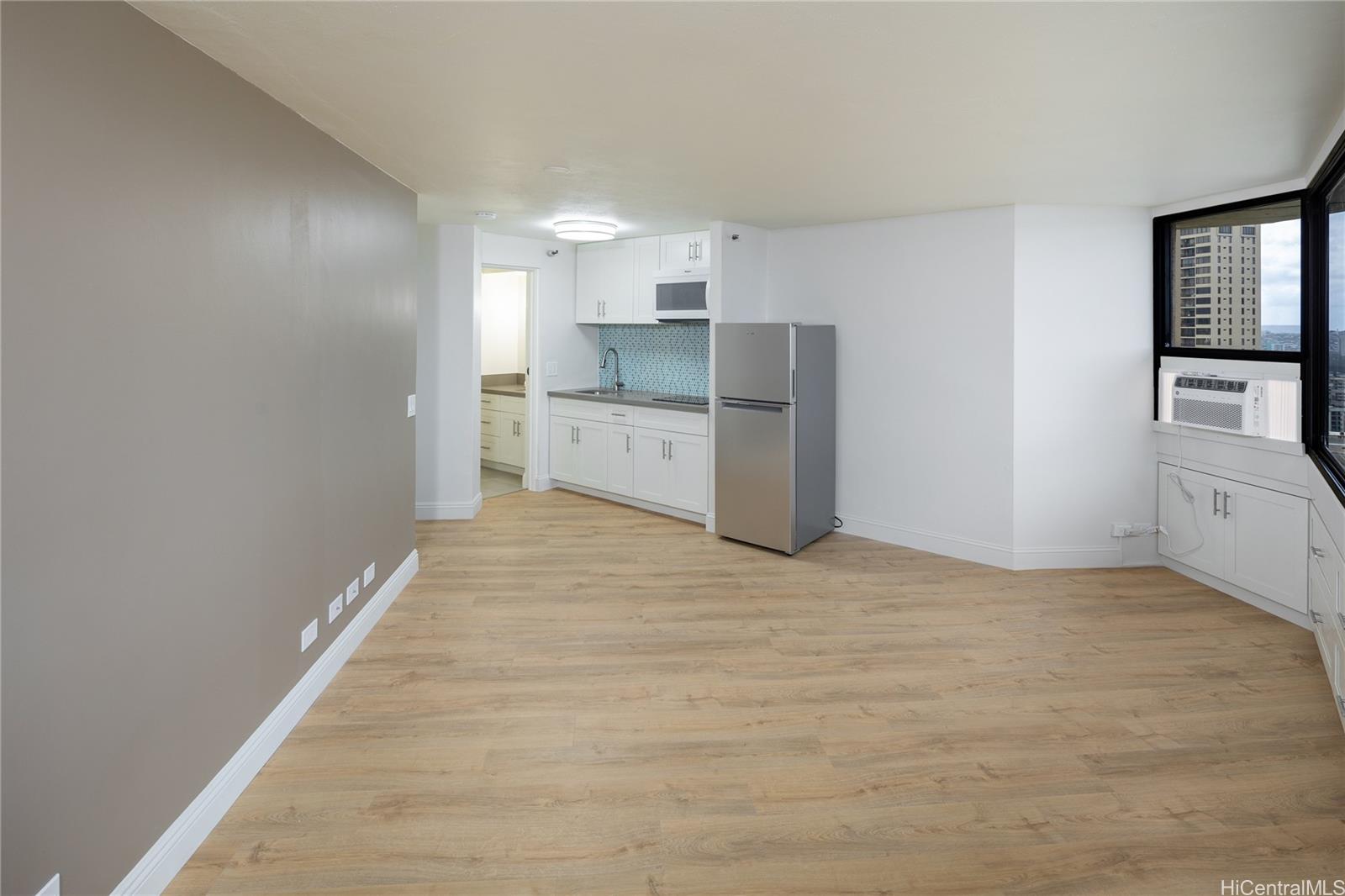 1700 Ala Moana Boulevard, Unit 3104 Honolulu, HI 96815 - Photo 5 of 15 a view of a kitchen with a sink