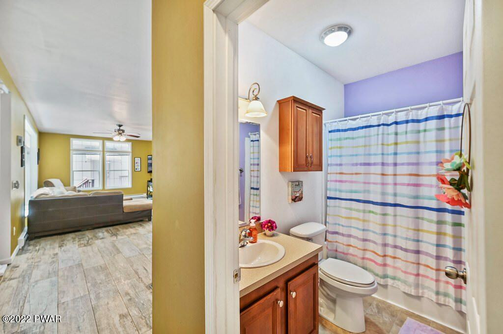 131 Anderson Road Lake Ariel, PA 18436 - Photo 22 of 47 a bathroom with a sink mirror vanity and toilet