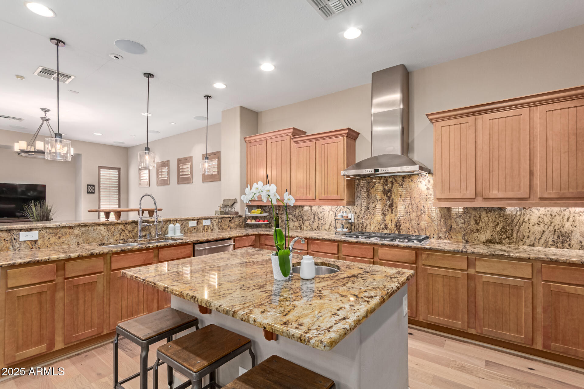 3981 East Navigator Lane Phoenix, AZ 85050 - Photo 9 of 36 a kitchen with stainless steel appliances granite countertop a sink counter space and cabinets