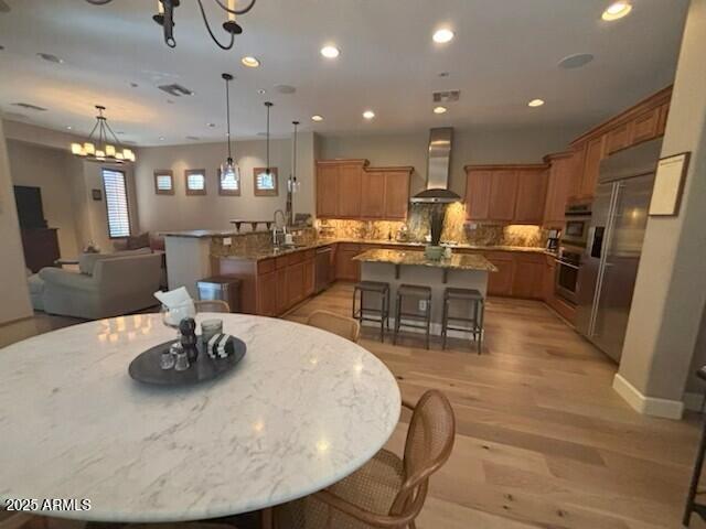3981 East Navigator Lane Phoenix, AZ 85050 - Photo 10 of 36 a kitchen with a table and chairs