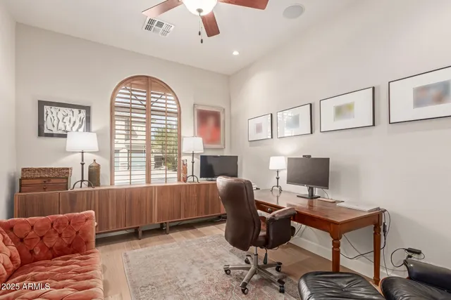 a view of room with wooden floor