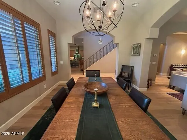 a kitchen with a table and chairs