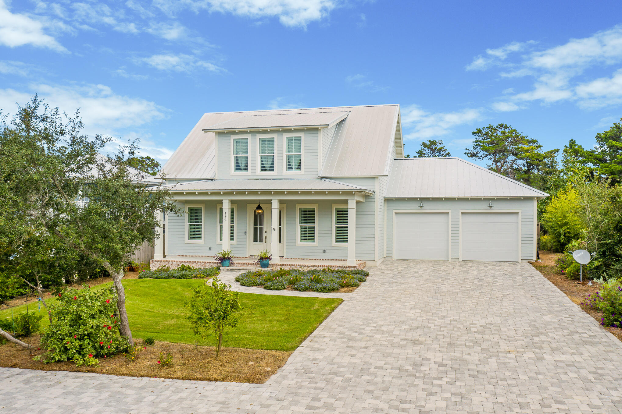 126 Crescent Road Santa Rosa Beach, FL 32459 - Photo 1 of 46 a front view of a house with garden