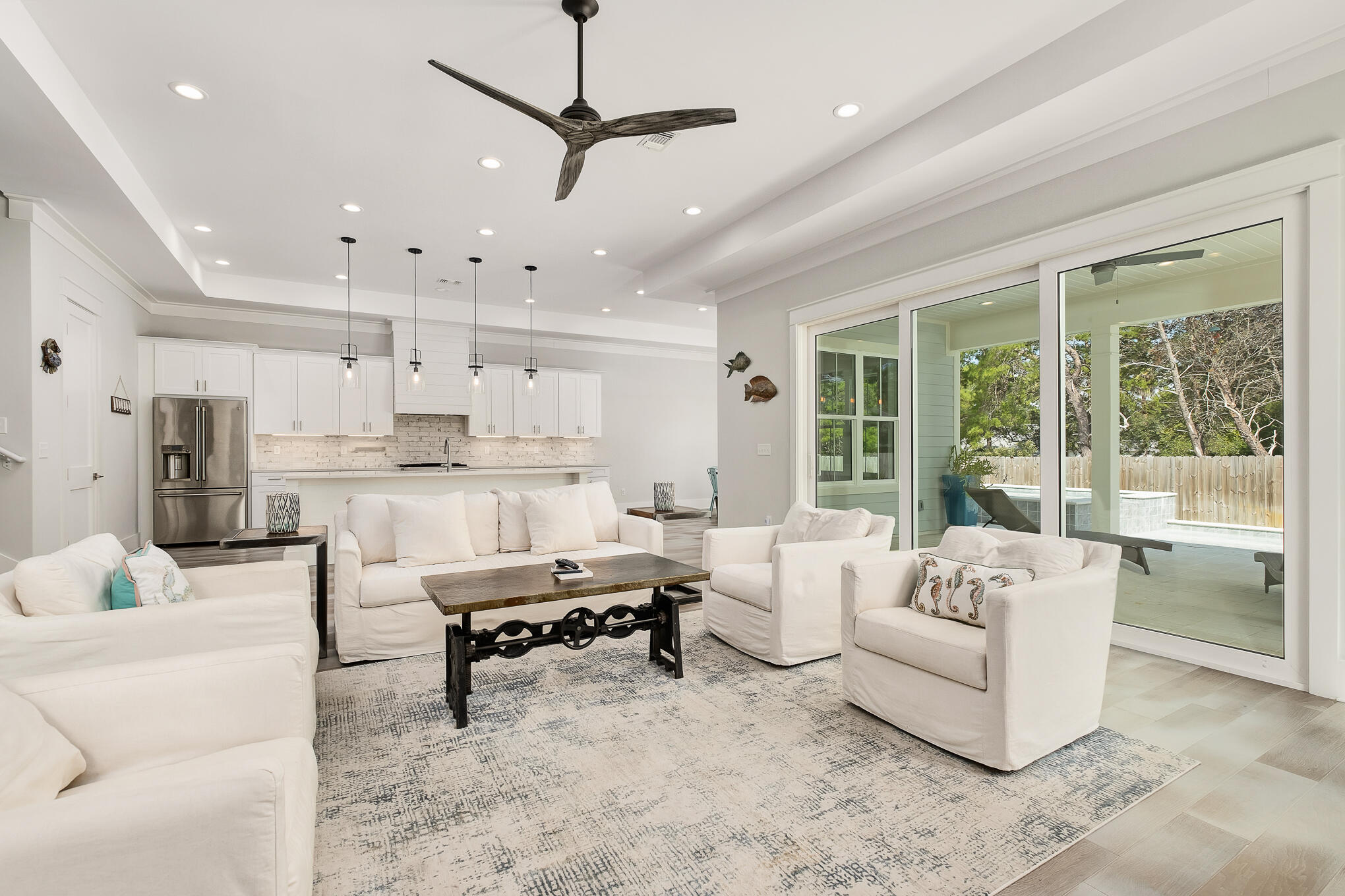126 Crescent Road Santa Rosa Beach, FL 32459 - Photo 20 of 46 a living room with furniture and a large window