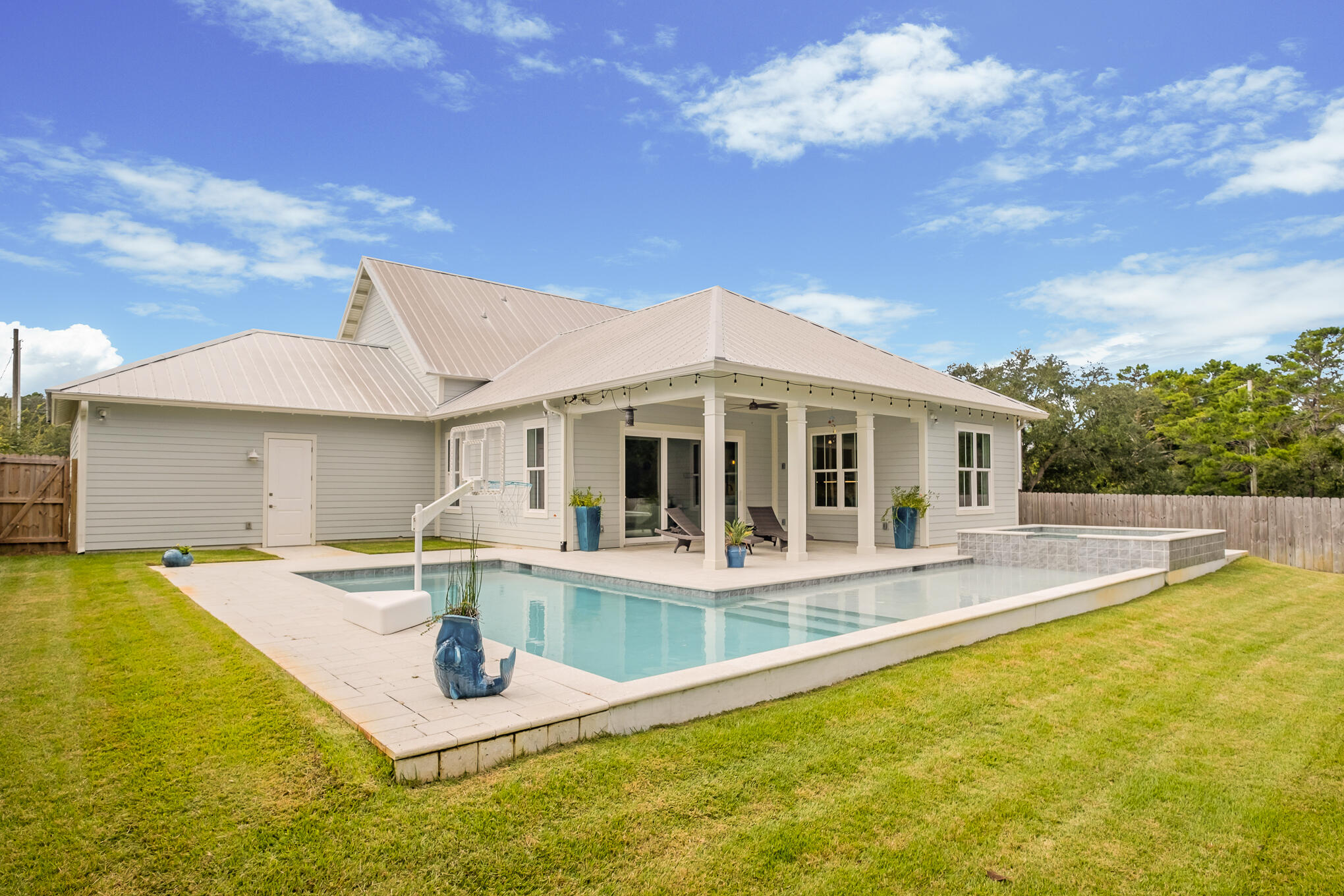 126 Crescent Road Santa Rosa Beach, FL 32459 - Photo 3 of 46 a view of a house with swimming pool and sitting area