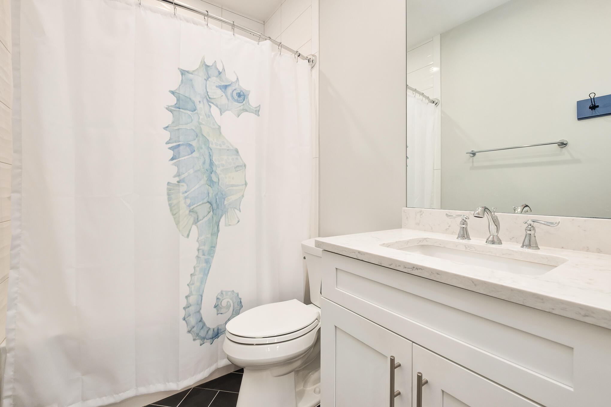 126 Crescent Road Santa Rosa Beach, FL 32459 - Photo 31 of 46 a bathroom with a granite countertop sink a toilet and a shower